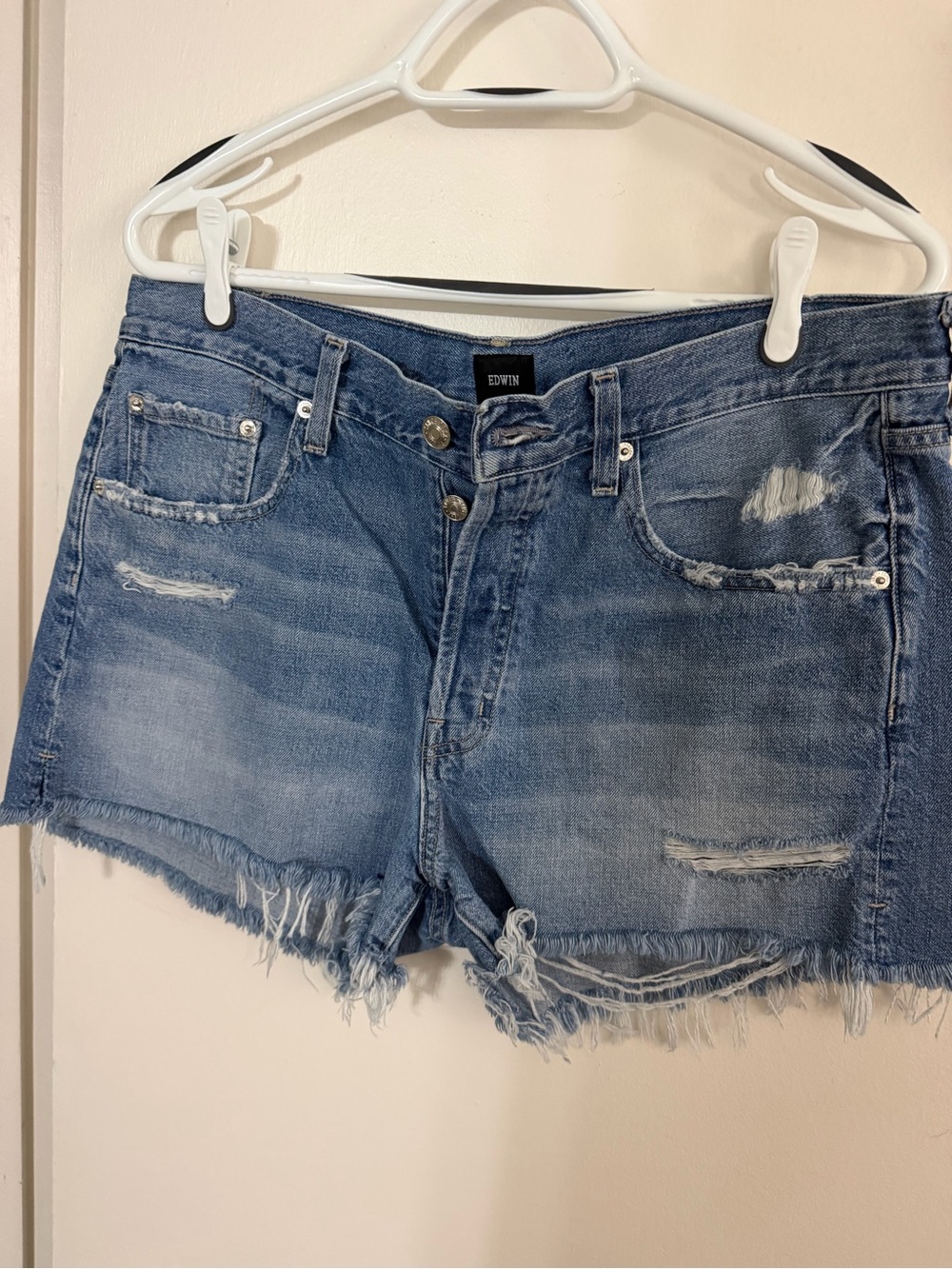 Edwin Light Blue Distressed Denim Cutoff Shorts
